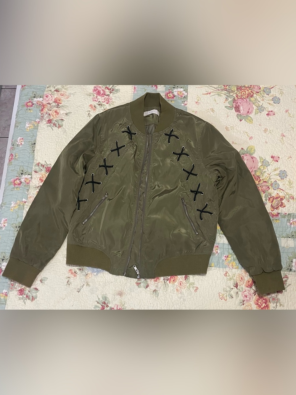 Elodie Olive Green Bomber Jacket with Black Lace-Style Cross Accents